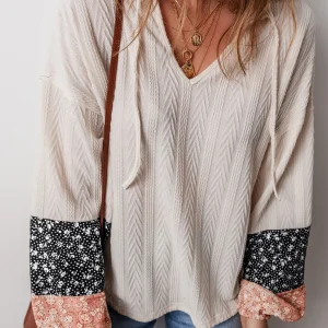 Blouse à cordon de serrage en tricot texturé floral