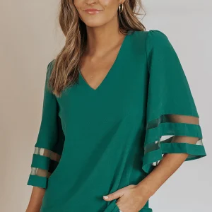 Blouse ample à manches évasées et col en V