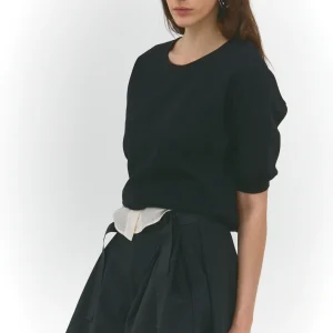 Alix – Short noir à plis structurés et rubans noués