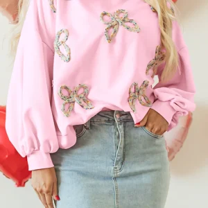 Sweat-shirt oversize a noud brodé