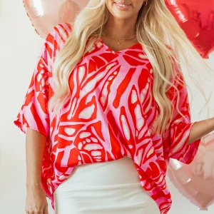 Blouse surdimensionnée abstraite a manches chauve-souris