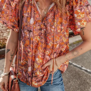 Blouse florale a volants et manches flottantes